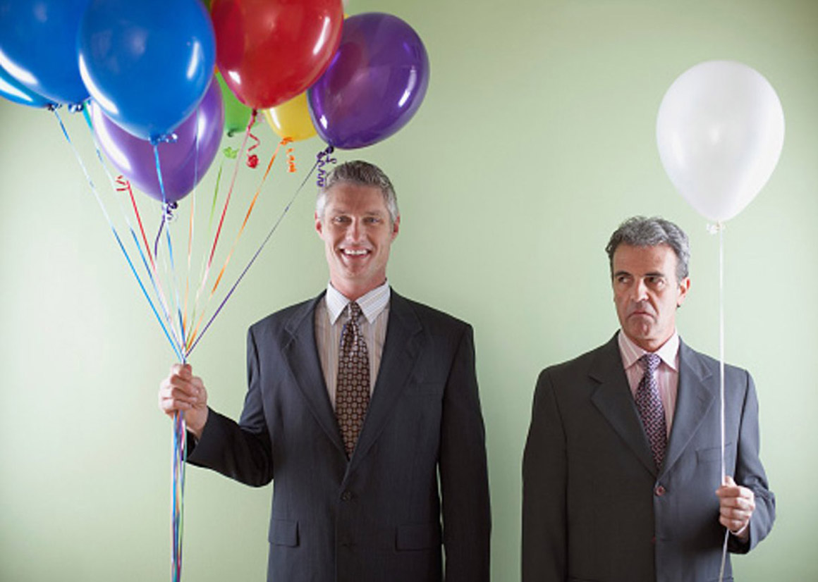 Mitarbeiter mit Luftballons